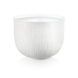 White ceramic bowl with textured surface on a white background