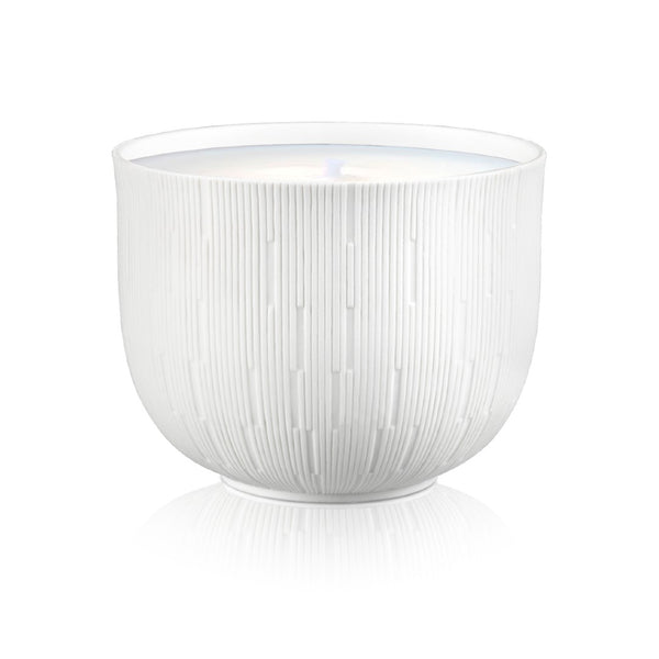White ceramic bowl with textured surface on a white background
