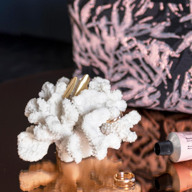 Small white faux coral sculpture with delicate branching styled for rings