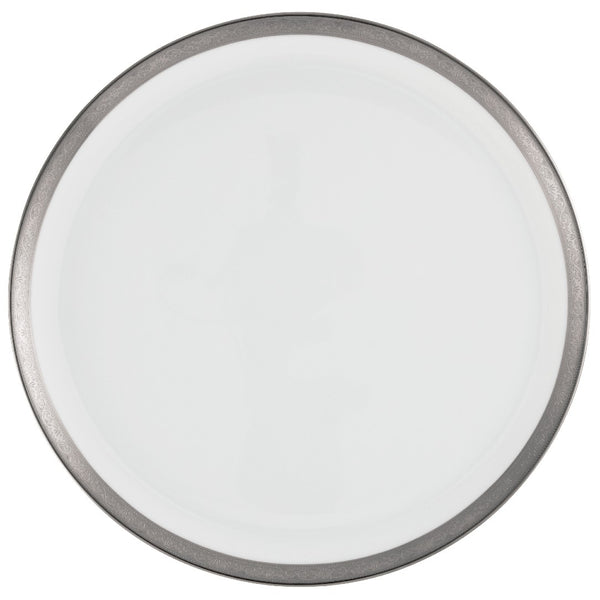 A round porcelain cake serving plate with a white center and a platinum border with Renaissance style decorations.
