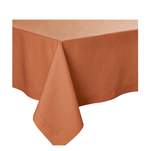 A copper-colored, plain dye pure linen tablecloth with mitred corners and hemstitch.