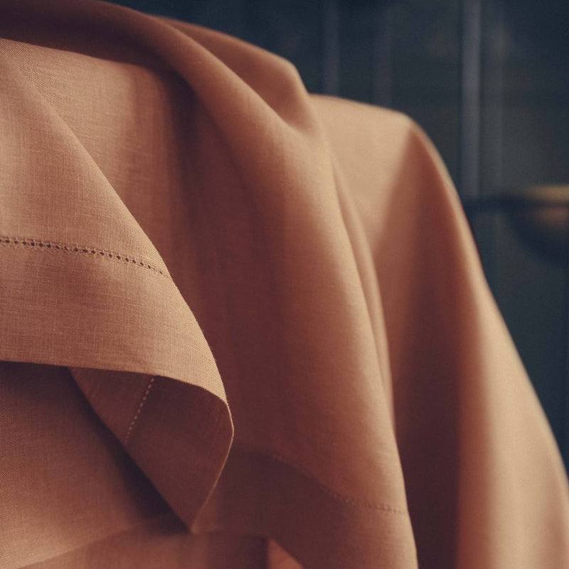 Close-up of brown fabric with a blurred background