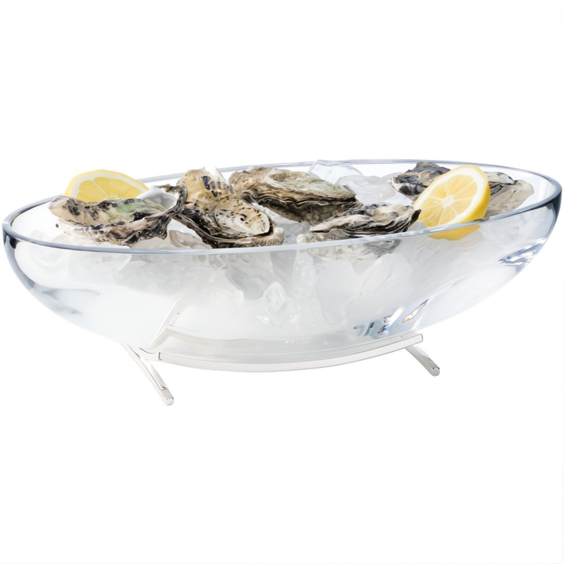 Footed crystal oyster bowl with silver-plated base by Sonja Quandt with oysters and lemon wedges on a white background