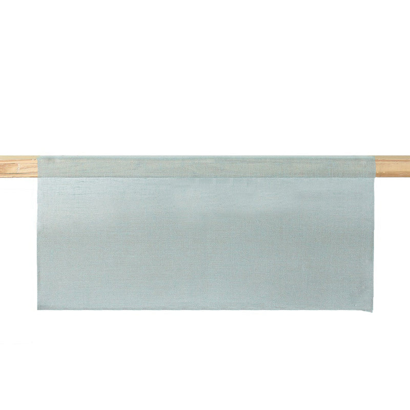 garza sage green table runner hanged on a wooden poll