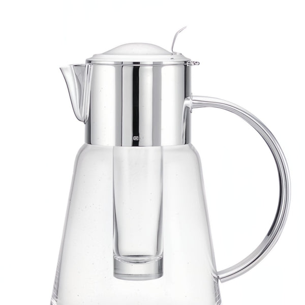 Close-up of Luxury glass jug Tuileries with silver-plated lid, handle, and ice tube by Ercuis – elegant French design for sophisticated dining and yachts.