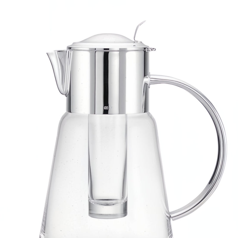 Close-up of Luxury glass jug Tuileries with silver-plated lid, handle, and ice tube by Ercuis – elegant French design for sophisticated dining and yachts.