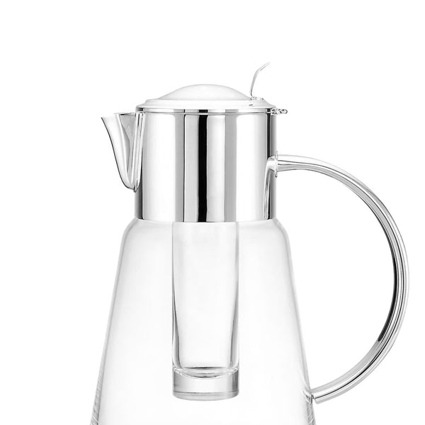 Close-up Luxury glass pitcher with silver-plated lid, handle, and ice tube by Greggio – elegant Italian design for refined dining and yacht service.