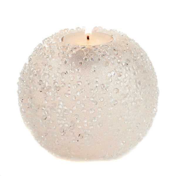 Silver glittery spherical candle holder on a white background