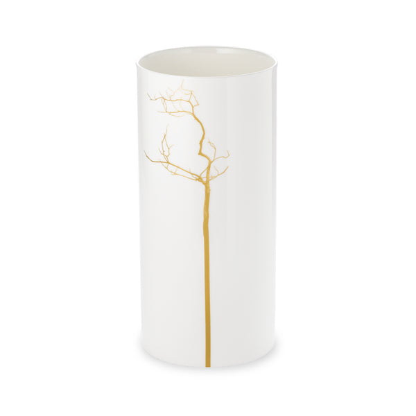 A white porcelain vase with a golden tree silhouette design that extends over the vase's rim.