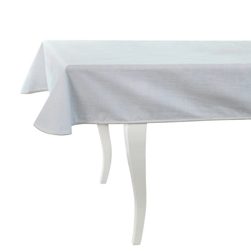 white tablecloth in cotton on a table with white legs and white background
