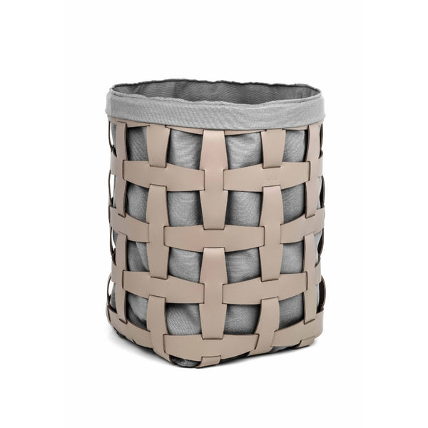 Woven laundry basket with a gray liner on a white background