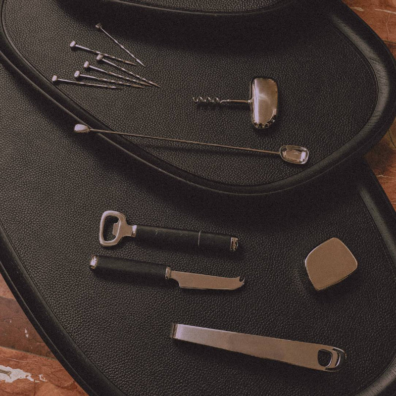 Styled black trays with Stainless steel ice tongs Maris by Kelly Wearstler x Giobagnara