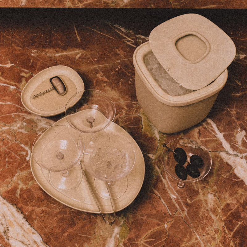 Styled marble counter with Stainless steel ice tongs Maris by Kelly Wearstler x Giobagnara