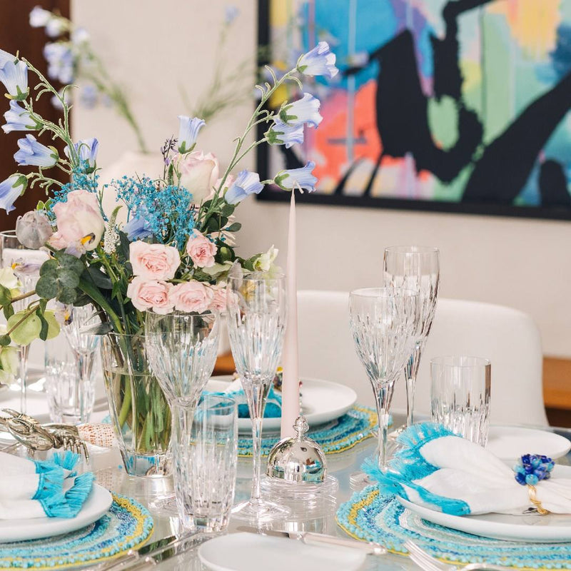 Elegant table setting with floral centerpiece and Individual silver-plated butter dish with crystal base and cover by Ercuis