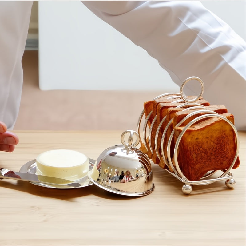 Bread basket with bread slices, butter dish Latitude by Ercuis on a wooden table.