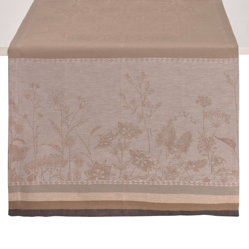 beige floral pattern table runner on white background