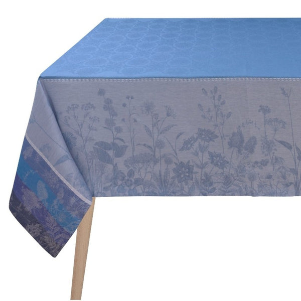 Blue floral-patterned tablecloth on a table