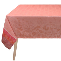 Pink floral patterned tablecloth on a white background