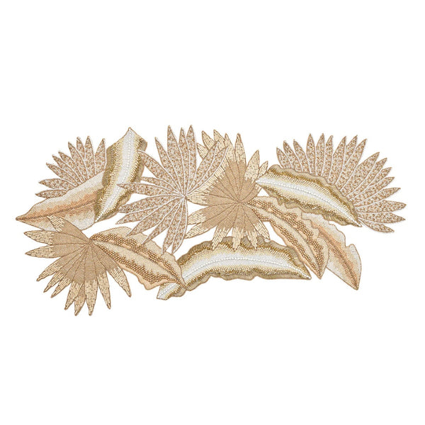 A table runner with a leaf pattern featuring natural, gold, and silver colored beads, displayed on a white background.