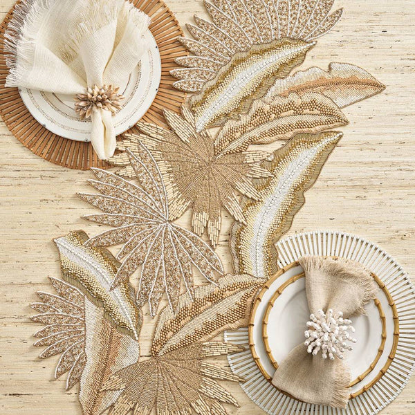 styled java runner in natural and gold with placemats and plates