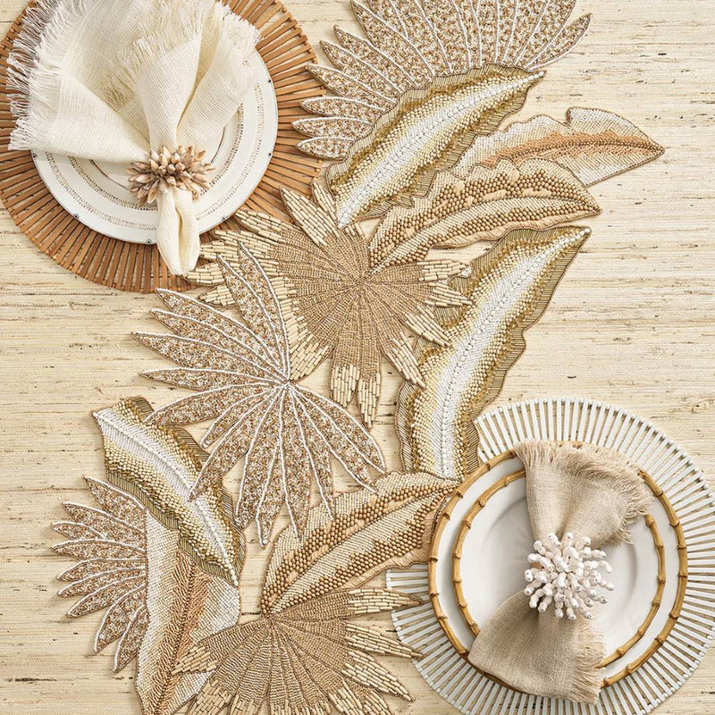 styled java runner in natural and gold with placemats and plates