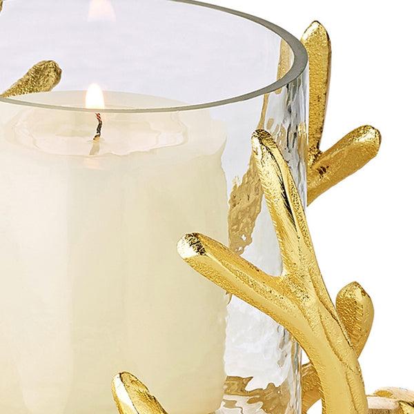 close-up of Kingston hurricane candle holder by Edzard with gold deer antlers and clear glass bowl, height 13 cm