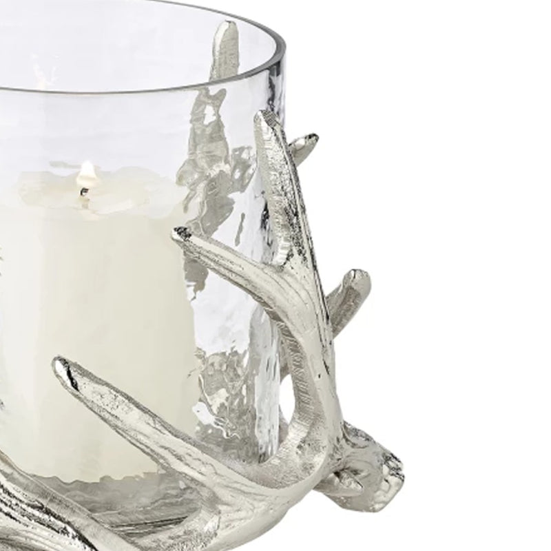 close up of Kingston hurricane candle holder by Edzard with steel antlers and clear glass bowl, height 15 cm