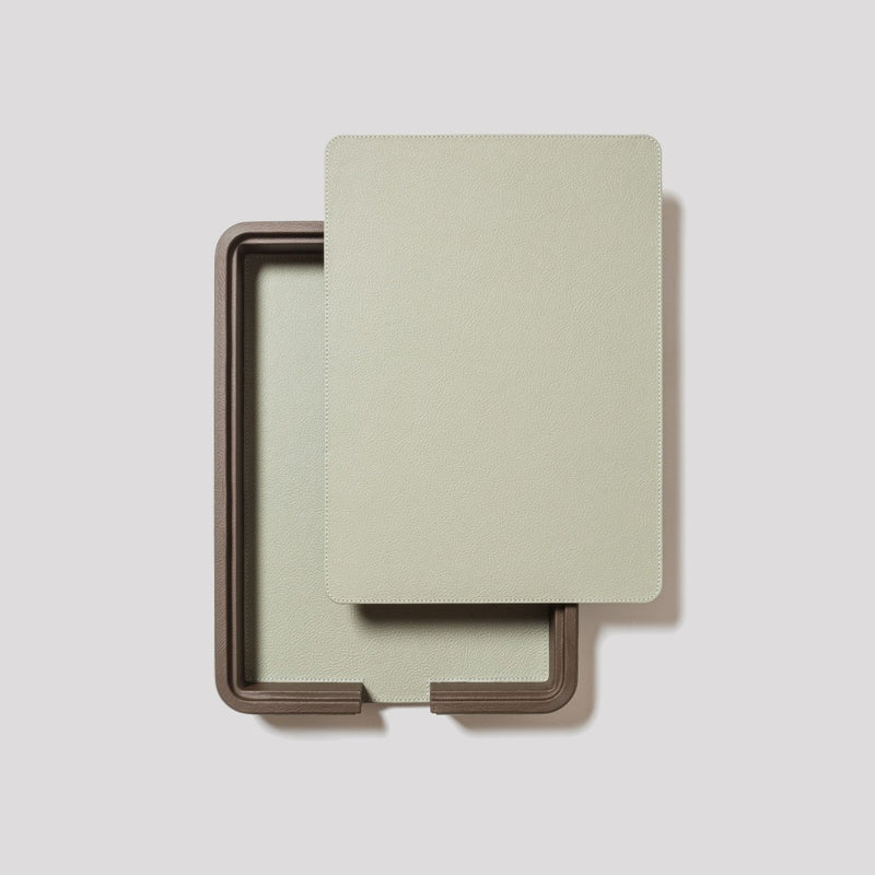 Giobagnara x Poltrona Frau A4 leather paper tray with lid in Pelle Frau on a light gray background