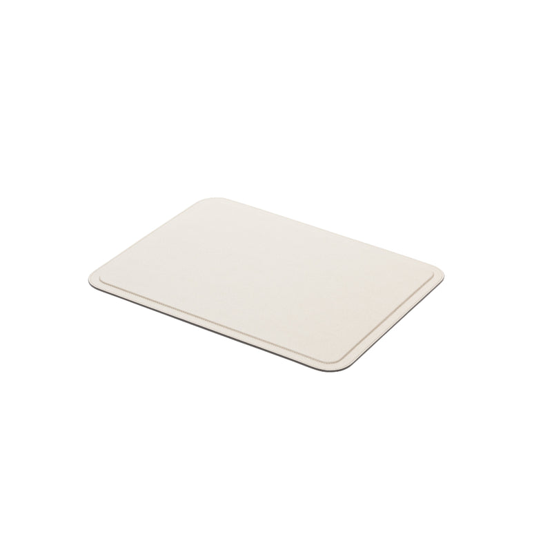 A beige leather desk blotter with minimal geometric lines design on a white background.