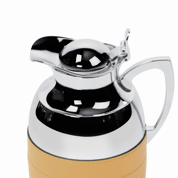 Close-up of Luxury insulated carafe Monochrome by Giobagnara in chrome-plated brass with Golf leather 