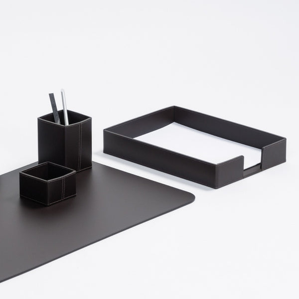 Black desk organizer set with tray, pen holder, and square container on a white background