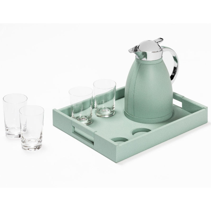 Mint green tray with a thermos and glasses on a white background