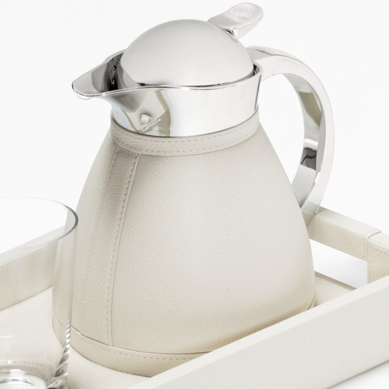 Close-up Leather tray set Beaubourg with Chantilly 0.6L carafe and one glass by Pigment France.
