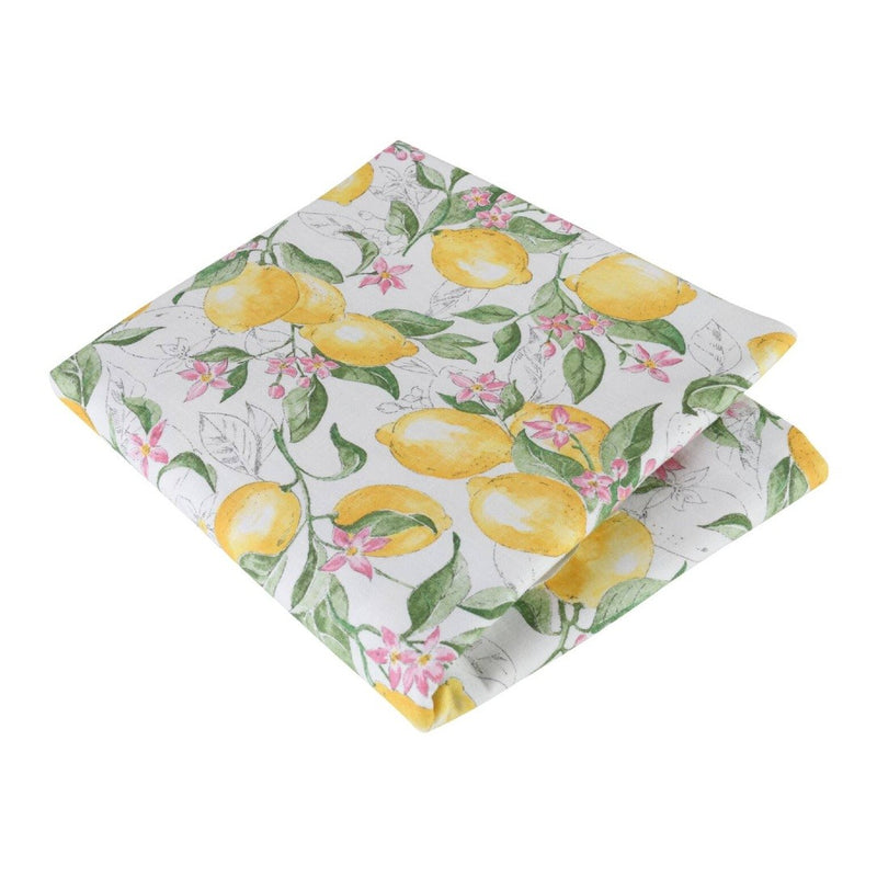Folded fabric with lemon and floral pattern on a white background