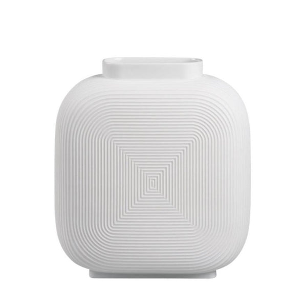White textured square vase on a white background
