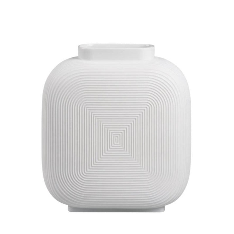 White textured square vase on a white background