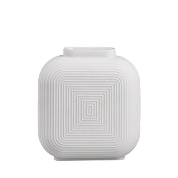 White textured square vase on a white background