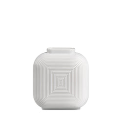 A white, geometric patterned porcelain vase with a modern design.