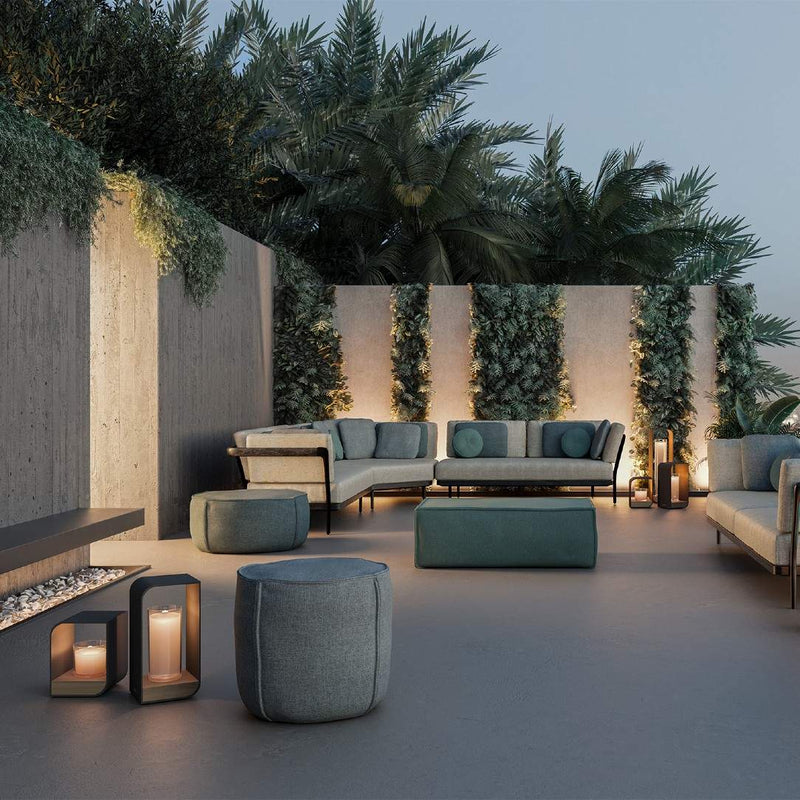 styled terrace with Lumo rechargeable outdoor lantern in Lava, small size, with Iroko wood base and aluminium frame by Manutti