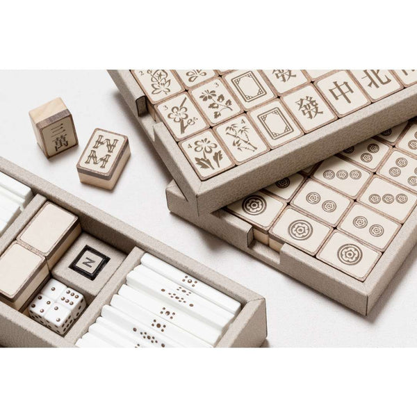 Close-up Open Mahjong Lux Game Set by Giobagnara showing walnut and maple tiles with leather inlay