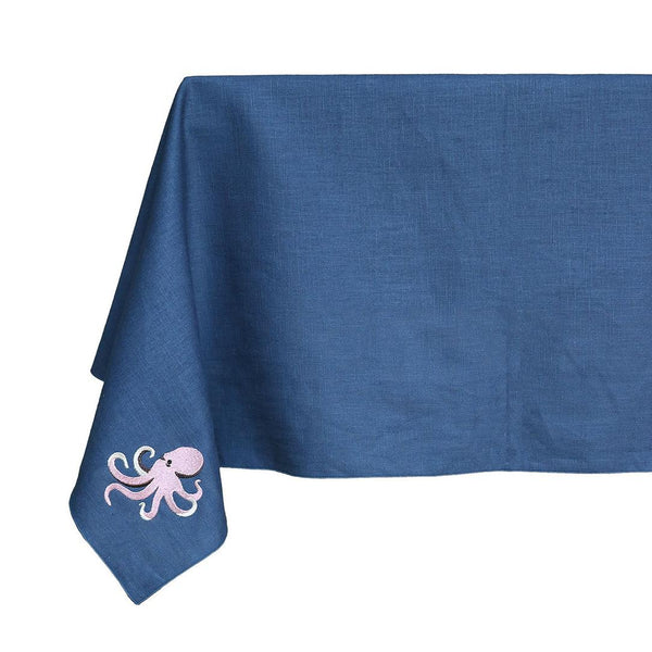Blue tablecloth with a pink octopus design on a white background