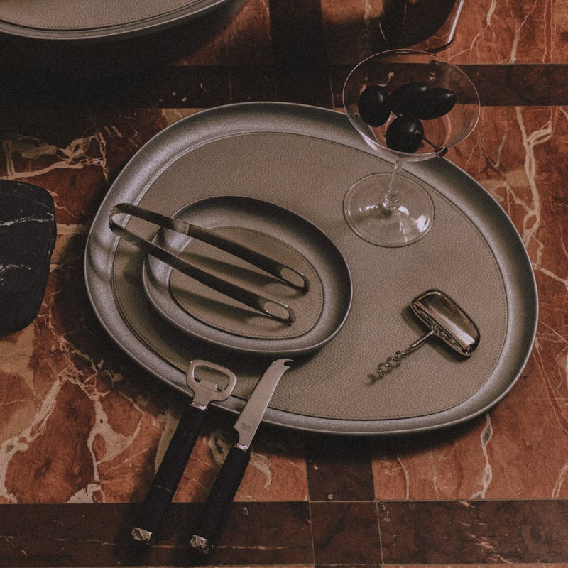 Maris Bottle Opener in stainless steel and marble Marquina Black styled tray by Kelly Wearstler x Giobagnara