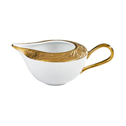 Porcelain milk jug/creamer with gold handle, spout, and detailing from the Italian Renaissance Gold collection by Raynaud.