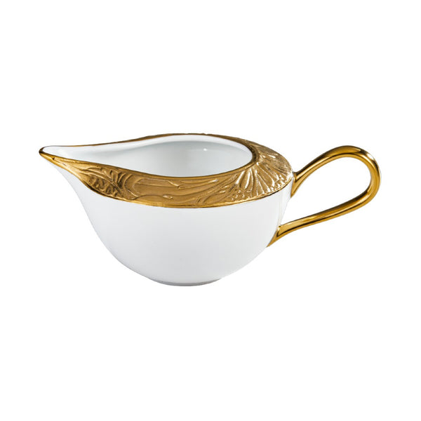 Porcelain milk jug/creamer with gold handle, spout, and detailing from the Italian Renaissance Gold collection by Raynaud.