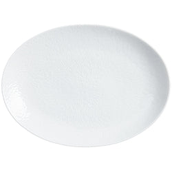 Fully engraved large oval platter in Minéral White by Raynaud, sculpted porcelain for elegant serving