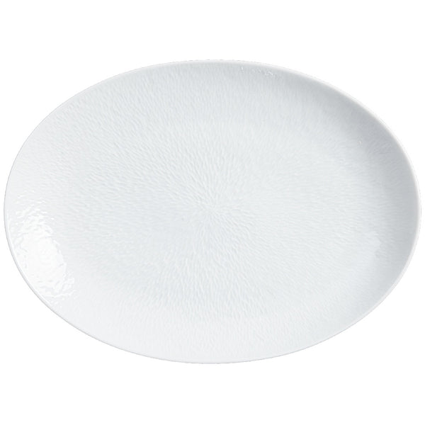 Fully engraved large oval platter in Minéral White by Raynaud, sculpted porcelain for elegant serving