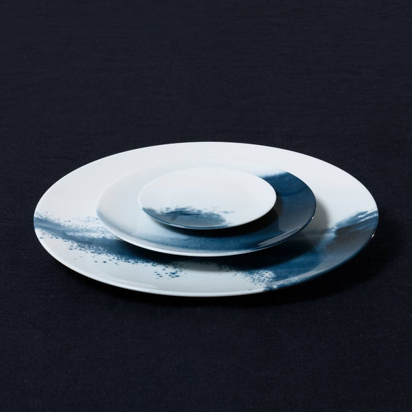 Indigo and white Limoges porcelain mini plate Abysses by Raynaud on a black background