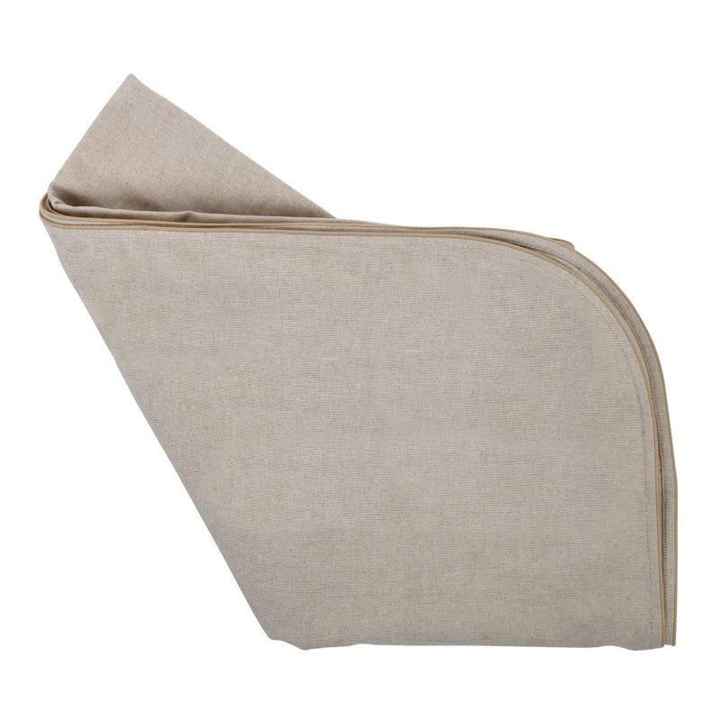 Folded beige fabric on a white background