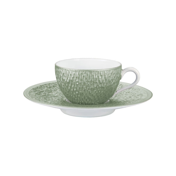 Raynaud Minéral Irisé Céladon porcelain moka cup and saucer with sculptural relief and iridescent celadon glaze