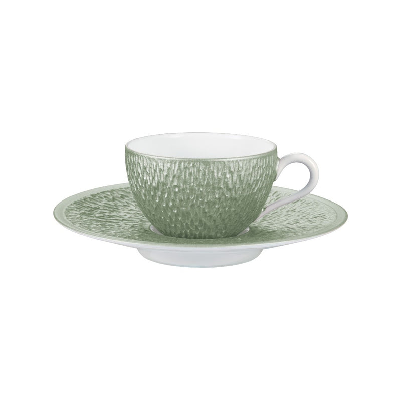 Raynaud Minéral Irisé Céladon porcelain moka cup and saucer with sculptural relief and iridescent celadon glaze